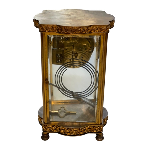 213 - Late 19th Century gilt four glass, eight day mantel clock, 29cm.