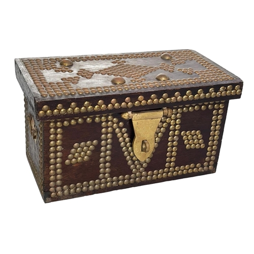 216 - Brass studded box, 27cm wide.