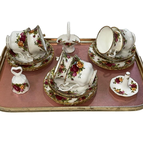 22 - Six Royal Albert Old Country Roses cups and saucers, ring stand, bell and basket.