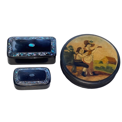 220 - Three 19th Century papier mache snuff boxes.