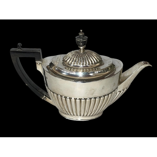 239 - Silver part fluted teapot, London 1906.