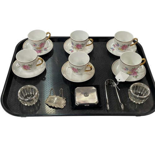 3 - Silver engine-turned compact, silver tongs, label and mounted salts, and six coffee cups and saucers... 