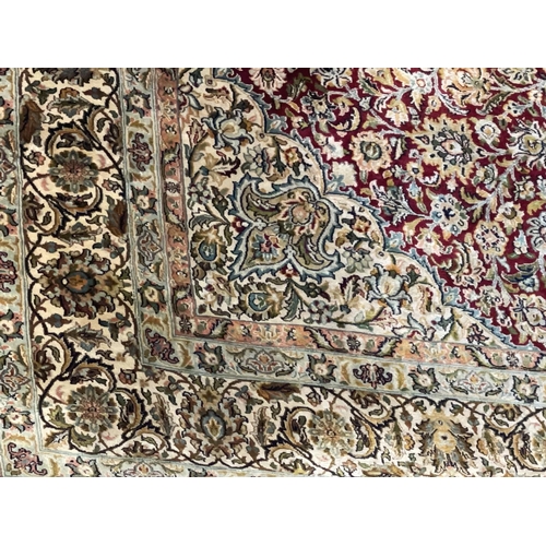 300 - Kashmir hand knotted silk rug 2.20 by 1.58.