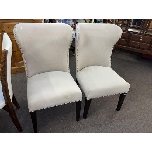 336 - Pair as new contemporary studded wing back side chairs.