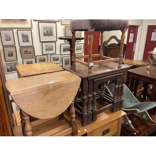 337 - Oak nest of three tables, Old Charm drop leaf coffee table, stool and rocking foot rest (4).