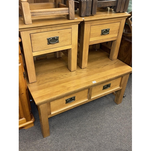 338 - Light oak two drawer low centre table and pair matching single drawer lamp tables (3).