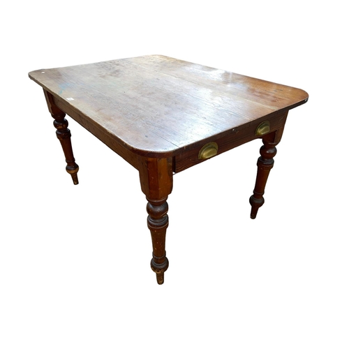 358 - Victorian pitch pine farmhouse kitchen table on turned legs, 76cm by 122cm by 89cm.