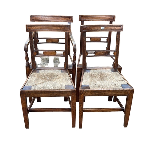 402 - Set of four Georgian rush seated Country chairs, carver and three single.