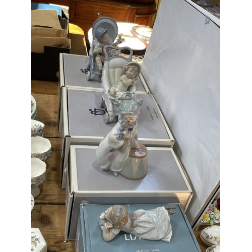 42 - Four Lladro figurines with boxes including F81CD, 501SH, 76CT4 and 041F5.