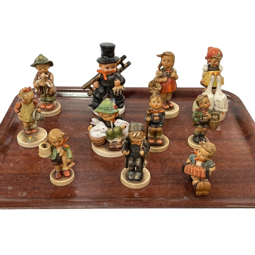 5 - Collection of eleven Hummel figures.