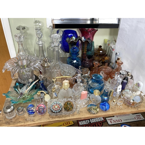 57 - Collection of glass including perfume bottles, paperweights, decanters, coloured glass, etc.