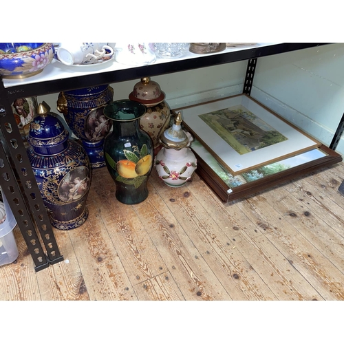 76 - Nine boxes of decorative pottery, vases, figurines, paintings, magazines, lamps etc.