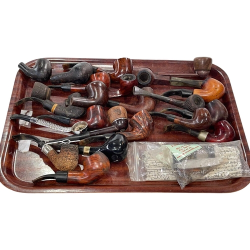 9 - Collection of over twenty pipes.