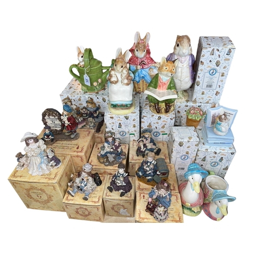 13 - Nine Beatrix Potter money boxes and others, and nine Yesterday's Child sculptures, all boxed.