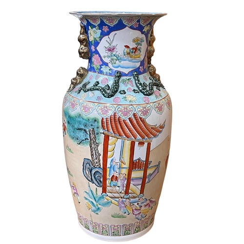 137 - Large Chinese floor vase decorated with figures in landscape, 76cm high.