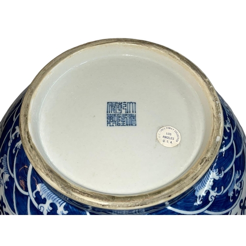 139 - Large Chinese blue and white two handled bulbous vase decorated with dragons and flowers, Qianlong m... 