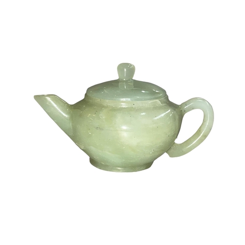 142 - Chinese jade miniature teapot, 6cm high.