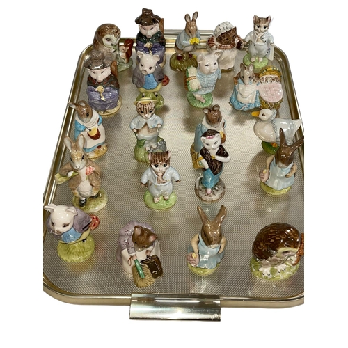 17 - Collection of twenty one Beswick Beatrix Potter figures including four gold backstamp, Mr Brown, Hun... 