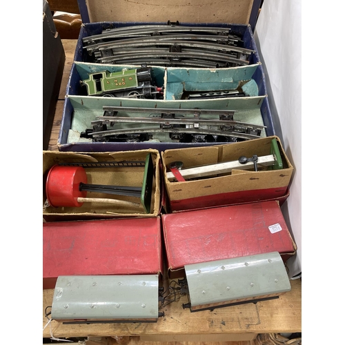 42 - Collection of Hornby tin plate train carriages, track, accessories, etc.