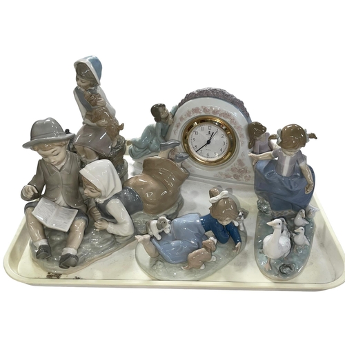 6 - Four pieces of Lladro including Two Sisters Clock and Hurry Now, and Nao boy and girl group (3).