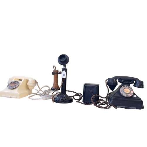 69 - Vintage stick telephone and two vintage dial telephones.