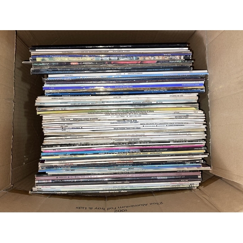 79 - Four boxes of LP and single records.