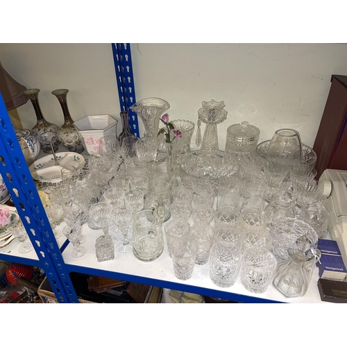 83 - Assorted china and glassware, brass ships and other clocks, pipes, LP records, binoculars, garden st... 