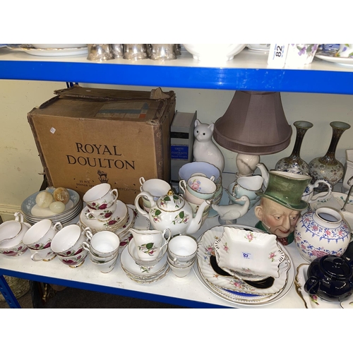 83 - Assorted china and glassware, brass ships and other clocks, pipes, LP records, binoculars, garden st... 