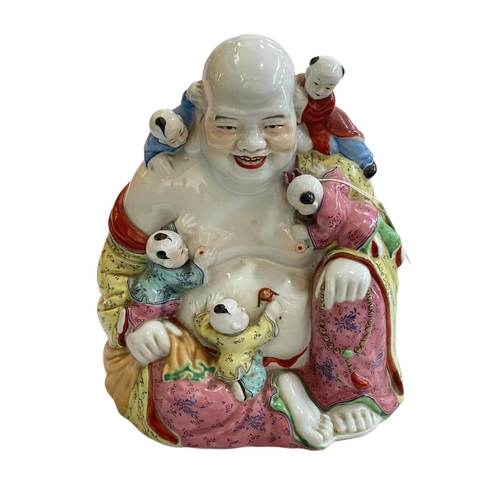 132 - Chinese famille rose Buddha, 25cm.