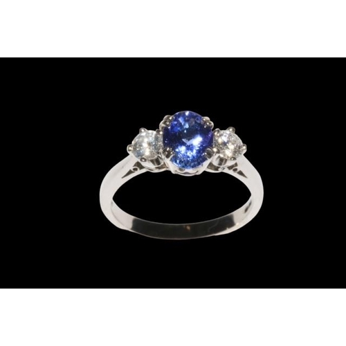 169 - 18 carat white gold tanzanite and diamond three stone ring, the tanzanite approximately 1.33 carats,... 