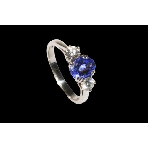 169 - 18 carat white gold tanzanite and diamond three stone ring, the tanzanite approximately 1.33 carats,... 