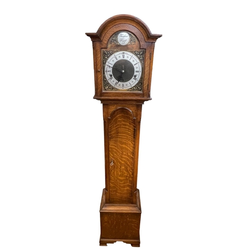 381 - Oak grandmother clock with Westminster chime, 137cm.