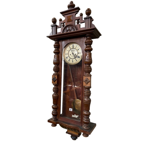 382 - Fattorini & Sons, Bradford, Victorian walnut cased double weight Vienna style wall clock, 118cm.