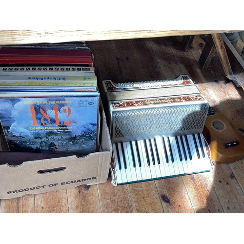 45 - Verdi II Hohner and an Alvani accordion together with two boxes of LP records.