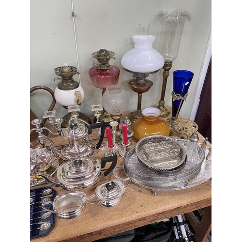 48 - Collection of Victorian oil lamps including ruby glass reservoir, brass columned, hand painted, clea... 