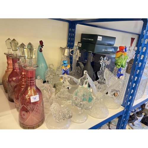 75 - Good collection of clear and coloured glass including glass decanters, glass clowns, paperweights, e... 