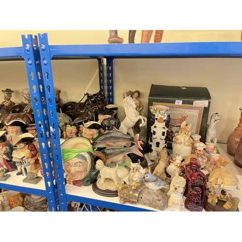 76 - Large collection of pottery figures, animal ornaments, toby jugs, two Doulton character jugs, Wedgwo... 