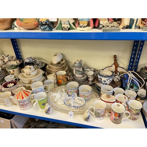 77 - Full shelf of china including dinner and teaware, planters, vases, ornaments, etc.