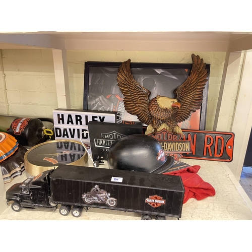 84 - Collection of Harley Davidson memorabilia, model motorcycles, trucks and emergency vehicles, etc.