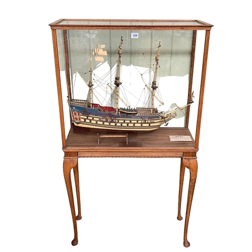 109 - Large model of a 17th Century masted ship 'Wasa' in oak glazed case on Queen Anne legs.