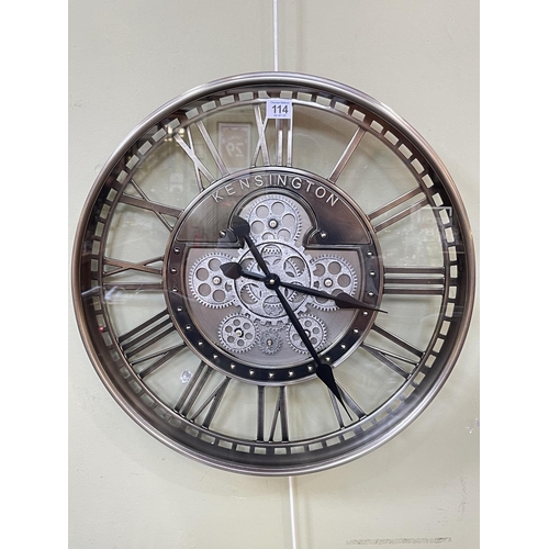 114 - Modern circular Kensington wall clock with visible moving cogs, 52cm diameter.