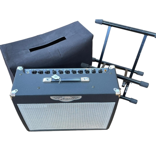 116 - Traynor 40 watt amplifier with spare valves, cables, foot pedal and folding stand.