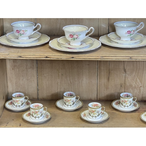 120 - Eleven Noritake 'Aubery' coffee cans and saucers, and six Royal Albert rose decorated trios.