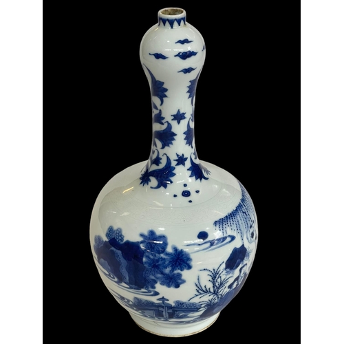 128 - Chinese blue and white tulip vase decorated with figures in landscape, 27cm.