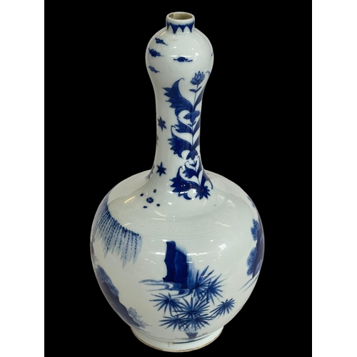 128 - Chinese blue and white tulip vase decorated with figures in landscape, 27cm.