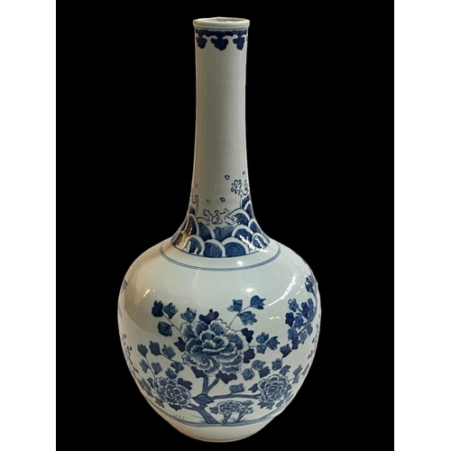 133 - Large Chinese blue and white bottle vase decorated with birds and flora, with twin ring mark to base... 