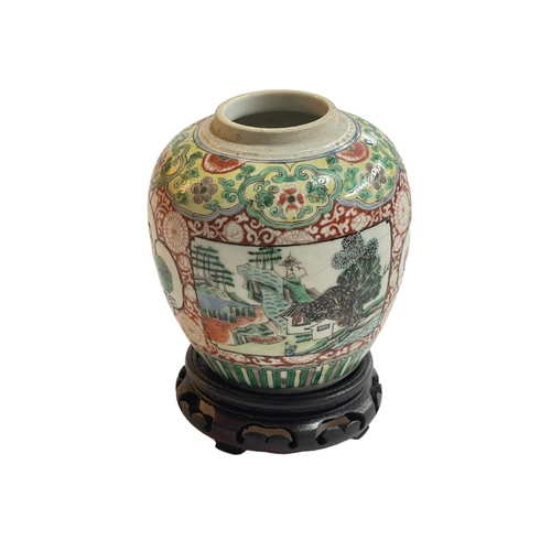 141 - Chinese famille verte baluster jar decorated with panels on floral ground, twin ring mark to base on... 