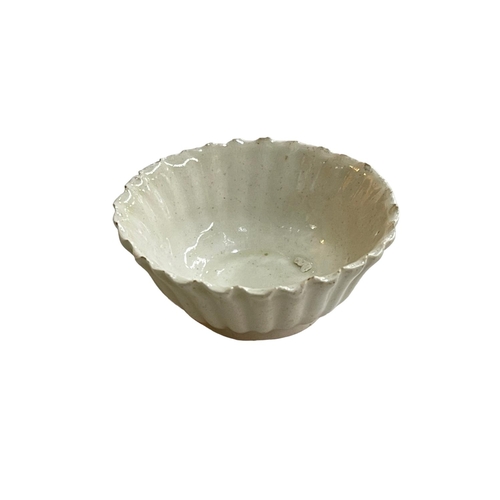 144 - Small Chinese scalloped edge white glazed bowl, 6.5cm diameter.