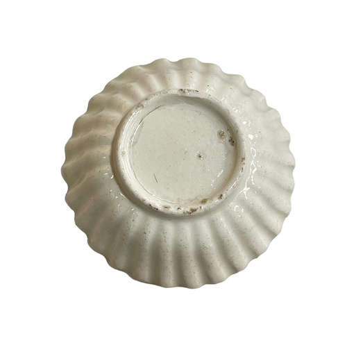 144 - Small Chinese scalloped edge white glazed bowl, 6.5cm diameter.