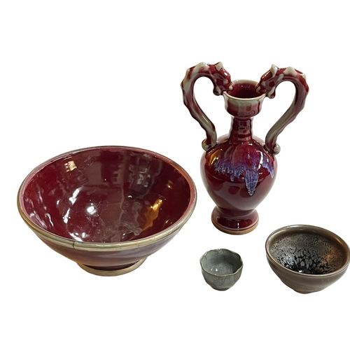 155 - Chinese flambé red glaze two handled vase, Oriental bowl and two small bowls (4).